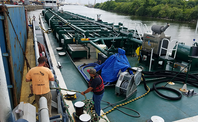 Large fuel barge hipped up to The Glory on the bayou in Houston during Hurricane Maria relief efforts.